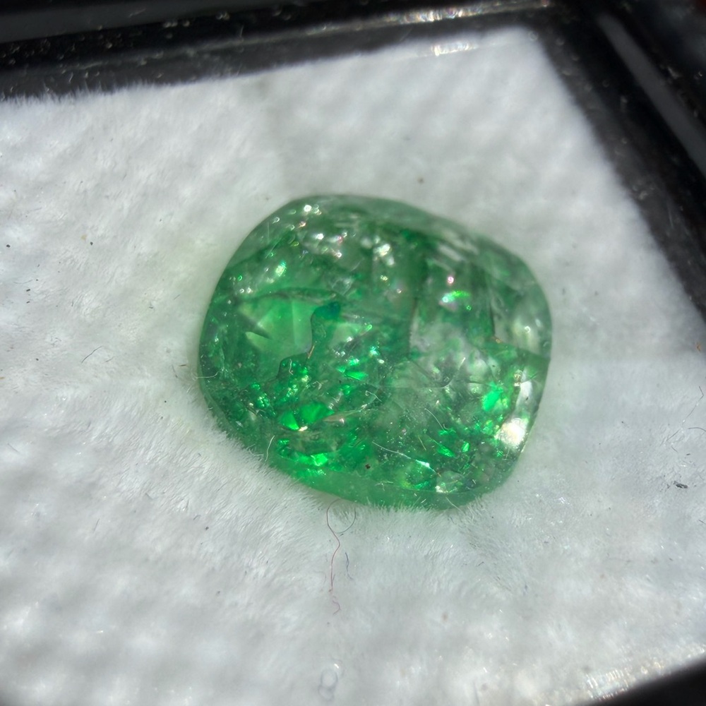 Authentic 1 of a kind Beautiful, green emerald cut perfectly ready to be set